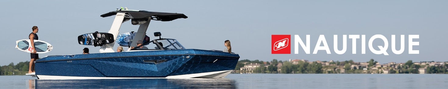 Nautique Boat with Wake Surfer standing at the back of the boat